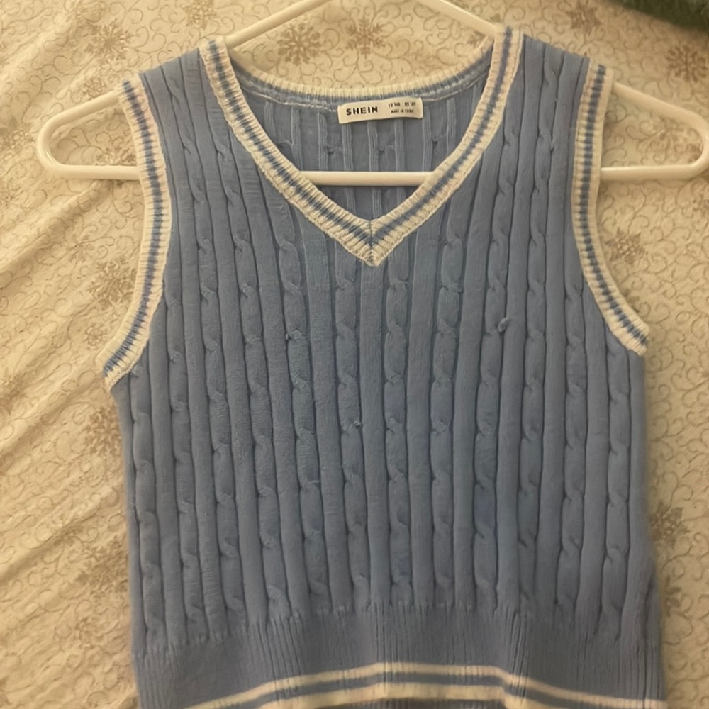 Knitted sweater from shein, periwinkle with white strips on the side, v neck
